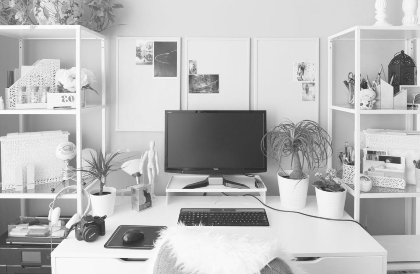 Professional working on strategic implementation with charts and planning documents